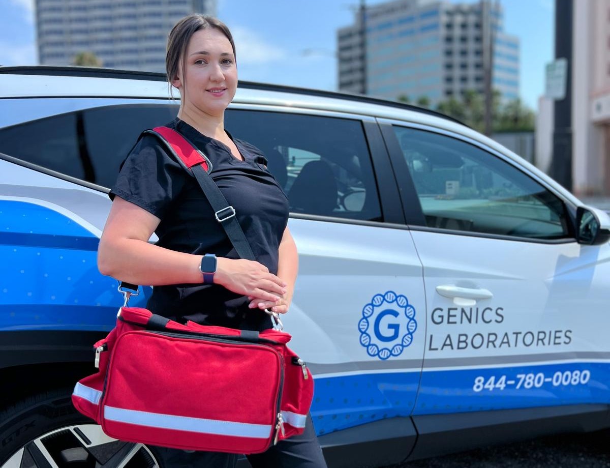 Genics Laboratories employee near the car
